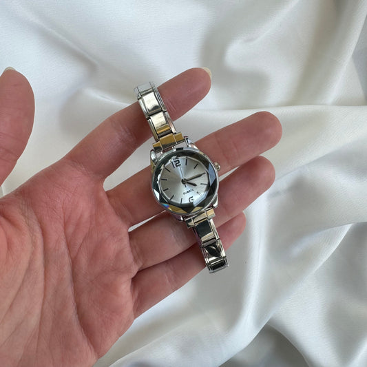 Yuvarlak NOMI Çelik Kordon Kadın Saat